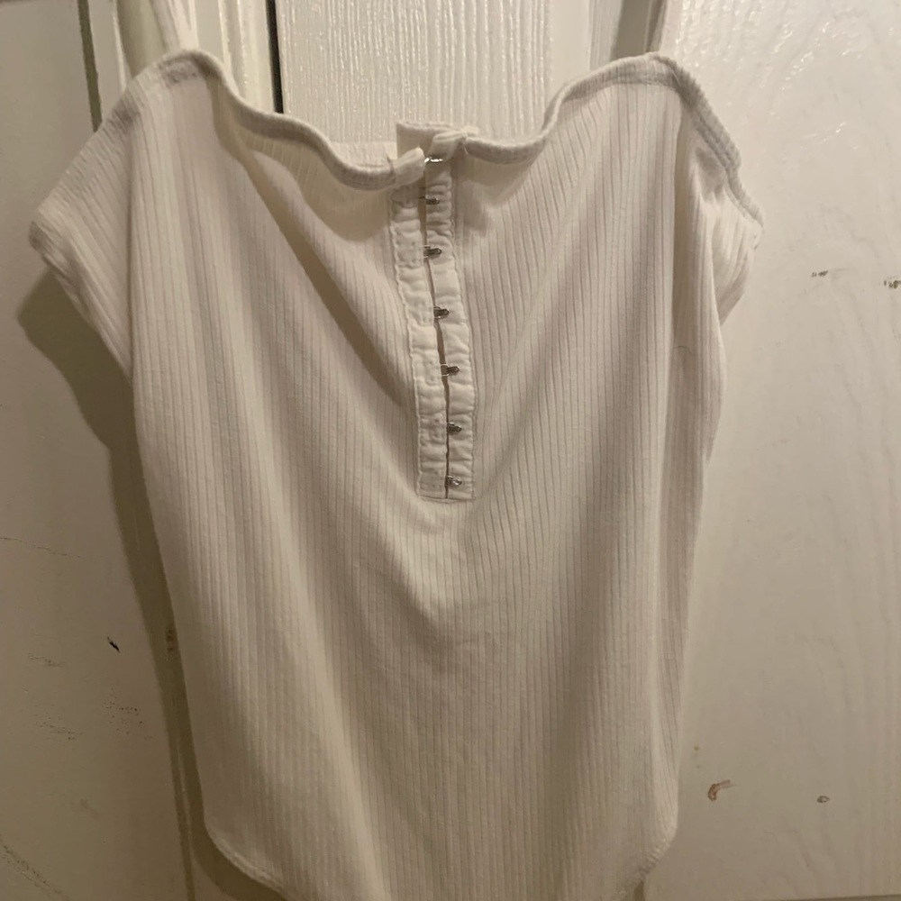 Garage hook-and-eye white bodysuit.